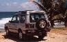 Land Rover Discovery on the Barbados shore
